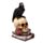 Figura de Cuervo Sobre Calavera y Libros