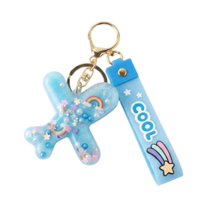 Llavero de PVC con charm Quirkeys Avión Arcoíris