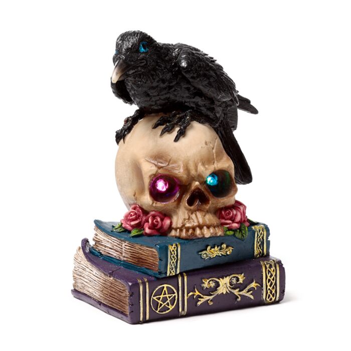 Figura de Cuervo Sobre Calavera y Libros con Luz LED